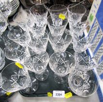 A group of cut glass drinking glasses.