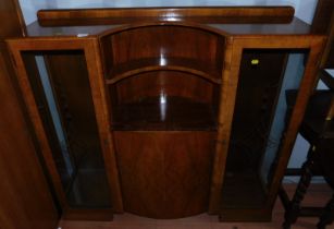 A mid 20thC walnut display cabinet, 124cm high, 123cm wide, 33cm deep.