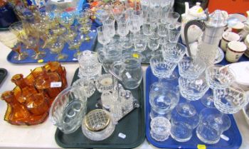 A group of glassware, to include drinking glasses, condiment jar and cover, amber tinted glass dress