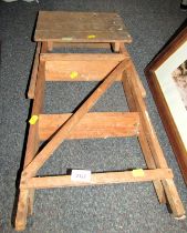 A wooden step ladder.