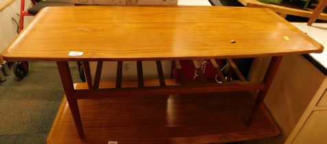 A Formwood teak coffee table, the rectangular top with a rounded edge above a slatted under tier, ra