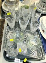 A group of glassware, to include champagne glasses, perfume bottles, part teawares, etc. (2 trays)