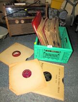 A KB vintage radio, together with various records.