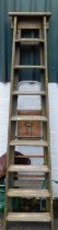 A wooden A frame step ladder, and another. (2)