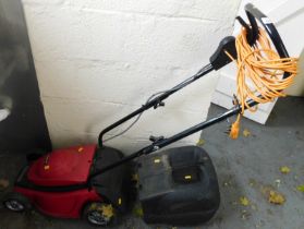 A Mountfield 1100 watt electric lawn mower.