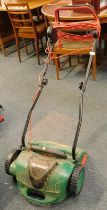 A Qualcast electric lawn raker, GLR750.