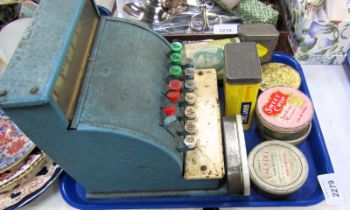 A Codeg mid century child's cash register, together with various bygone tins, etc. (a quantity)