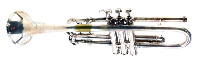 A Boosey and Hawkes trumpet, number 159541, in fitted case.