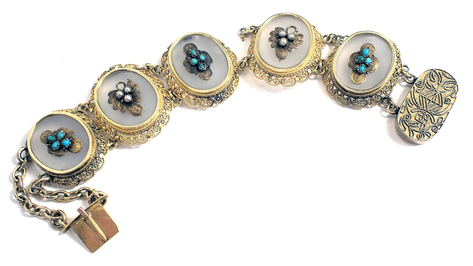 A Chinese filigree five sectional bracelet, each of oval form set with moonstone and raised seed pea
