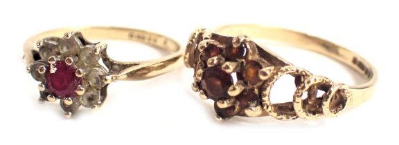 Two 9ct gold dress rings, each set with garnet, in a floral cluster, one with CZ, ring size M and I