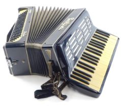 A Delfini piano accordion, by Loreto Italy, in carrying case.