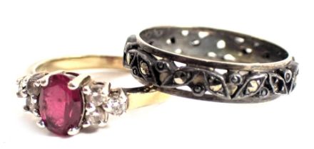 Two dress rings, comprising an eternity ring set with marcasite, yellow and white metal stamped 9ct