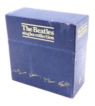 A Beatles blue box singles collection, with facsimile signatures to the box, comprising 26 singles,