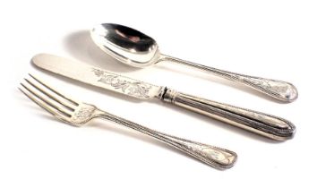 A Victorian silver christening set, each piece engraved with scrolls, roundels, etc., monogram to ha