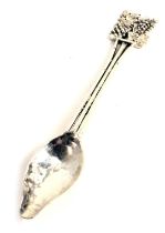 A George V Arts and Crafts silver spoon, with pineapple finial and hammered bowl by Amy Sandheim, 19