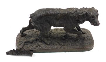 A bronzed spelter figure of a gun dog, on a rectangular base, unmarked, tail detached, the base 29cm
