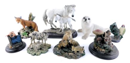 A group of animal ornaments, comprising Leonardo Collection wolf and cubs, Country Artists mouse and