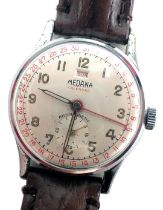 A Medana calendar day/date wristwatch, with a silvered numeric dial, with red seconds hand and outer