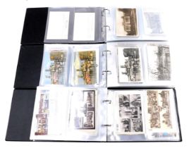 Deltiology. Three albums of postcards, early 20thC and later, black and white and coloured town