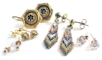 A group of earrings, comprising a pair of Eastern style drop earrings, with blue enamel decoration,