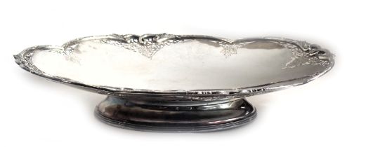 An Elizabeth II silver centrepiece or bowl, of lobed form with pierced borders, engraved with grapes