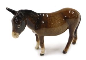 A Beswick ceramic model of a donkey.