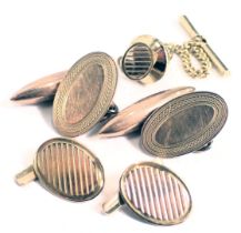 Two pair of 9ct gold oval engine turned cufflinks, one rose gold, 9.3g, and a plated collar stud.