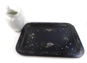 A Victorian black gilt and mother of pearl inlaid papier mache tray, 62cm wide (AF), and a wash jug.