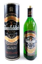 A Glenfiddich Single Malt Scotch Whisky, 1ltr bottle in cardboard tube.