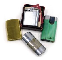 A chromium Butler Whirlwind lighter, and other lighters.