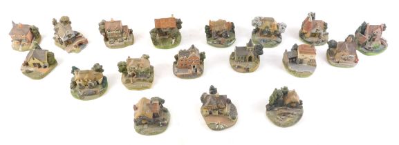 A quantity of Lilliput Lane style cottages, various makers to include Danbury Mint. (3 trays)