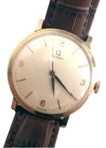 An Omega 9ct gold cased gent's wristwatch, with a silvered numeric dial and twenty one jewel movemen