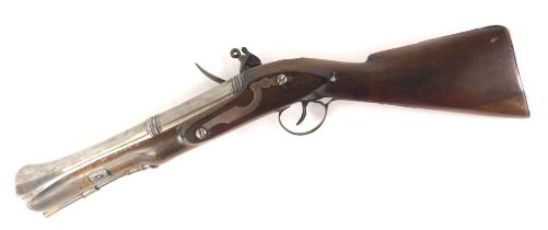 A late 18th/early 19thC blunderbuss, with part faceted steel barrel, walnut stock, and engraved with