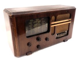 A Michael Radio of London and Slough oak cased radiogram, 35cm high, 62cm wide, 22cm deep.