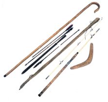 A three piece split cane fishing rod, two arrows, dagger, and a boomerang.