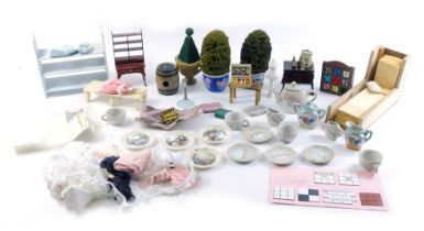 A quantity of doll's house furniture, a child's tea set, etc. (2 trays)