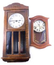 A 1920s oak wall clock with silvered dial, 67cm high, and an Abbey quartz wall clock. (2)