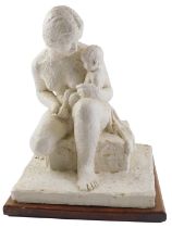 A 20thC sculpture or maquette, depicting a lady with a child, on a squared base with wooden plinth.