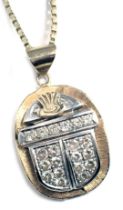 A diamond set scarab pendant, the pendant of bicolour design with white and yellow gold, the wings s