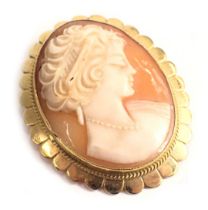 A shell cameo brooch, the oval cameo depicting maiden with flowing hair, in a 9ct gold petalated bor