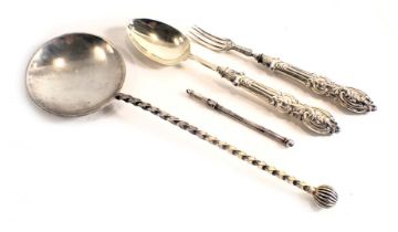 A Victorian silver christening set, comprising spoon and fork, with scroll cast handle, London 1865,