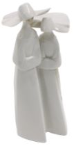 A Lladro figure of two standing nuns, 32cm high.