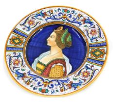 A 20thC Urbino Majolica pottery dish, decorated with a central portrait within borders of scrolls, f