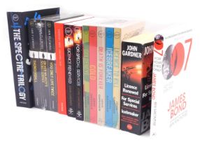 A small collection of James Bond paperback novels, including Fleming (Ian) The Spectre Trilogy Set,