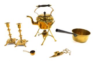 A late 19thC Arts and Crafts brass spirit kettle and stand, brass pan with iron handle, pair of cand
