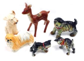 A collection of figurines, to include Sylvac terriers, ceramic kittens stamped M, and a Rynbende che