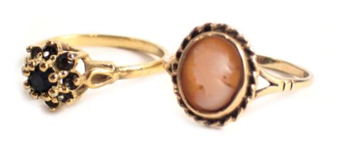 Two dress rings, comprising a cameo dress ring with rope twist border, yellow metal stamped 9ct, rin