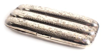 A George V silver cigar case, with three divisions, engraved overall with leaves and scrolls, Birmin