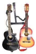 Audition Korean acoustic guitar, and a Gear 4 Music acoustic guitar, and a guitar stand. (3)