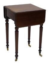 A Victorian mahogany work table, the rectangular drop leaf top with moulded edges, above a frieze dr